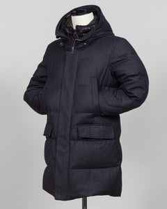 The Montecore VBC Flannel Down Coat delivers refined warmth with understated sophistication. Crafted from premium VBC flannel in deep charcoal grey, this jacket balances structure and comfort for versatile layering across seasons.

Filled with responsibly sourced down insulation, it provides exceptional thermal efficiency without excess bulk. The classic silhouette suits tailored wardrobes—layer it over dress shirts for office wear or pair casually with knitwear for weekend elegance.

VBC's heritage Italian