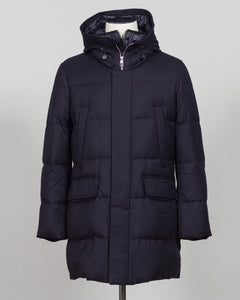 The Montecore VBC Flannel Down Coat delivers refined warmth with understated sophistication. Crafted from premium VBC flannel in navy, this jacket balances structure and comfort for versatile layering across seasons.

Filled with responsibly sourced down insulation, it provides exceptional thermal efficiency without excess bulk. The classic silhouette suits tailored wardrobes—layer it over dress shirts for office wear or pair casually with knitwear for weekend elegance.

VBC's heritage Italian mills ensure 