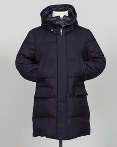The Montecore VBC Flannel Down Coat delivers refined warmth with understated sophistication. Crafted from premium VBC flannel in navy, this jacket balances structure and comfort for versatile layering across seasons.

Filled with responsibly sourced down insulation, it provides exceptional thermal efficiency without excess bulk. The classic silhouette suits tailored wardrobes—layer it over dress shirts for office wear or pair casually with knitwear for weekend elegance.

VBC's heritage Italian mills ensure 