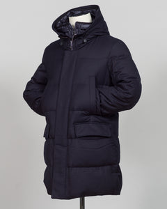 The Montecore VBC Flannel Down Coat delivers refined warmth with understated sophistication. Crafted from premium VBC flannel in navy, this jacket balances structure and comfort for versatile layering across seasons.

Filled with responsibly sourced down insulation, it provides exceptional thermal efficiency without excess bulk. The classic silhouette suits tailored wardrobes—layer it over dress shirts for office wear or pair casually with knitwear for weekend elegance.

VBC's heritage Italian mills ensure 