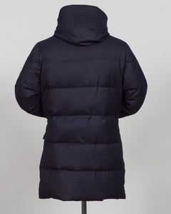 The Montecore VBC Flannel Down Coat delivers refined warmth with understated sophistication. Crafted from premium VBC flannel in navy, this jacket balances structure and comfort for versatile layering across seasons.

Filled with responsibly sourced down insulation, it provides exceptional thermal efficiency without excess bulk. The classic silhouette suits tailored wardrobes—layer it over dress shirts for office wear or pair casually with knitwear for weekend elegance.

VBC's heritage Italian mills ensure 