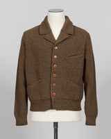 A masterful collaboration between G.R.P. Firenze and Max Rohr, this knitted wool jacket merges Italian craftsmanship with contemporary design. The rich brown tone offers versatile styling across seasons, while the structured knit construction provides both warmth and refined elegance. Perfect for layering or wearing as a statement piece, this jacket embodies the luxury menswear aesthetic with its understated sophistication and impeccable attention to detail.