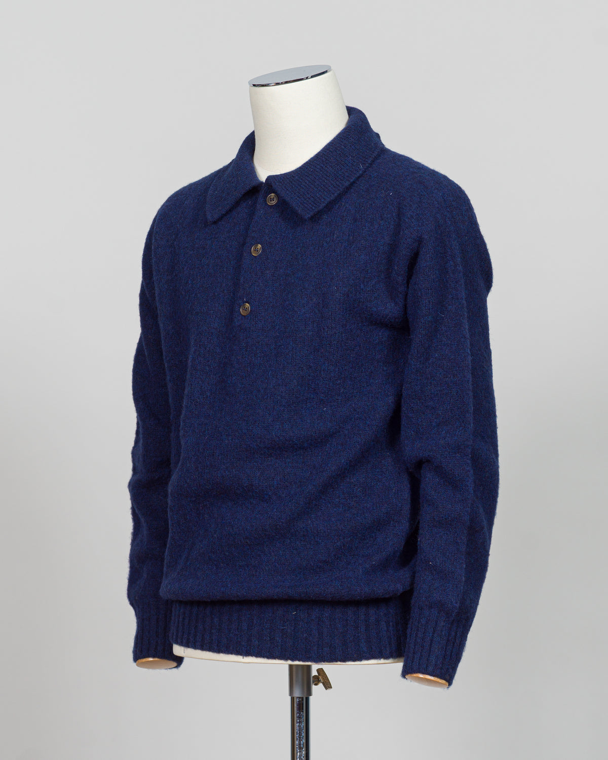 Crafted from luxurious shaggy wool, this Harley of Scotland polo combines traditional Scottish heritage with refined versatility. The textured knit delivers exceptional softness and warmth. Perfect for layering or wearing standalone, it transitions seamlessly from casual weekends to smart-casual occasions. The structured polo collar and quality construction ensure lasting appeal season after season.
