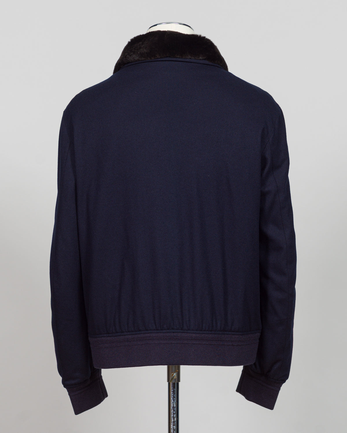 The Montecore Blouson Jacket exemplifies modern tailoring with its refined silhouette and versatile navy colorway. Crafted from premium materials, this blouson delivers structured elegance suitable for both professional and refined casual settings.

The jacket features a contemporary fit that balances comfort with polished aesthetics. Its streamlined design works seamlessly layered over knitwear or worn as a standalone piece, making it an essential addition to a curated wardrobe.

Ideal for the discerning g