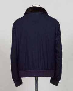 The Montecore Blouson Jacket exemplifies modern tailoring with its refined silhouette and versatile navy colorway. Crafted from premium materials, this blouson delivers structured elegance suitable for both professional and refined casual settings.

The jacket features a contemporary fit that balances comfort with polished aesthetics. Its streamlined design works seamlessly layered over knitwear or worn as a standalone piece, making it an essential addition to a curated wardrobe.

Ideal for the discerning g