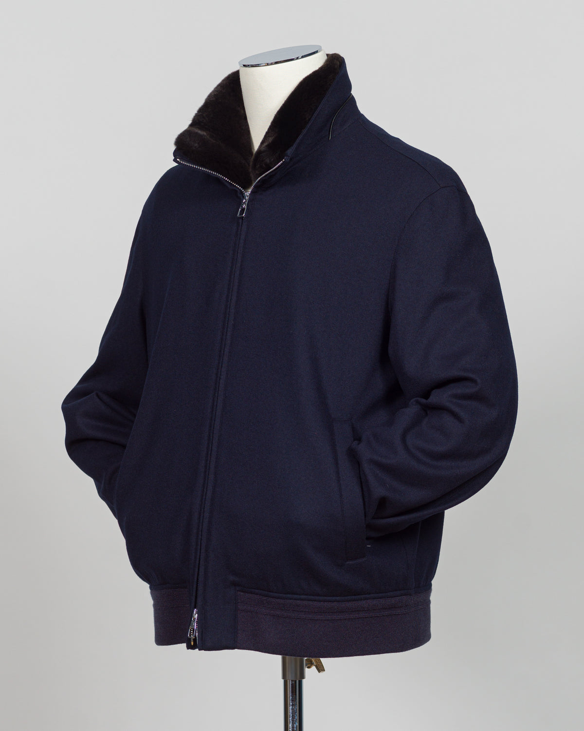 The Montecore Blouson Jacket exemplifies modern tailoring with its refined silhouette and versatile navy colorway. Crafted from premium materials, this blouson delivers structured elegance suitable for both professional and refined casual settings.

The jacket features a contemporary fit that balances comfort with polished aesthetics. Its streamlined design works seamlessly layered over knitwear or worn as a standalone piece, making it an essential addition to a curated wardrobe.

Ideal for the discerning g