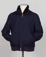 The Montecore Blouson Jacket exemplifies modern tailoring with its refined silhouette and versatile navy colorway. Crafted from premium materials, this blouson delivers structured elegance suitable for both professional and refined casual settings.

The jacket features a contemporary fit that balances comfort with polished aesthetics. Its streamlined design works seamlessly layered over knitwear or worn as a standalone piece, making it an essential addition to a curated wardrobe.

Ideal for the discerning g