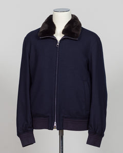 The Montecore Blouson Jacket exemplifies modern tailoring with its refined silhouette and versatile navy colorway. Crafted from premium materials, this blouson delivers structured elegance suitable for both professional and refined casual settings.

The jacket features a contemporary fit that balances comfort with polished aesthetics. Its streamlined design works seamlessly layered over knitwear or worn as a standalone piece, making it an essential addition to a curated wardrobe.

Ideal for the discerning g