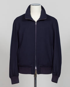 The Montecore Blouson Jacket exemplifies modern tailoring with its refined silhouette and versatile navy colorway. Crafted from premium materials, this blouson delivers structured elegance suitable for both professional and refined casual settings.

The jacket features a contemporary fit that balances comfort with polished aesthetics. Its streamlined design works seamlessly layered over knitwear or worn as a standalone piece, making it an essential addition to a curated wardrobe.

Ideal for the discerning g