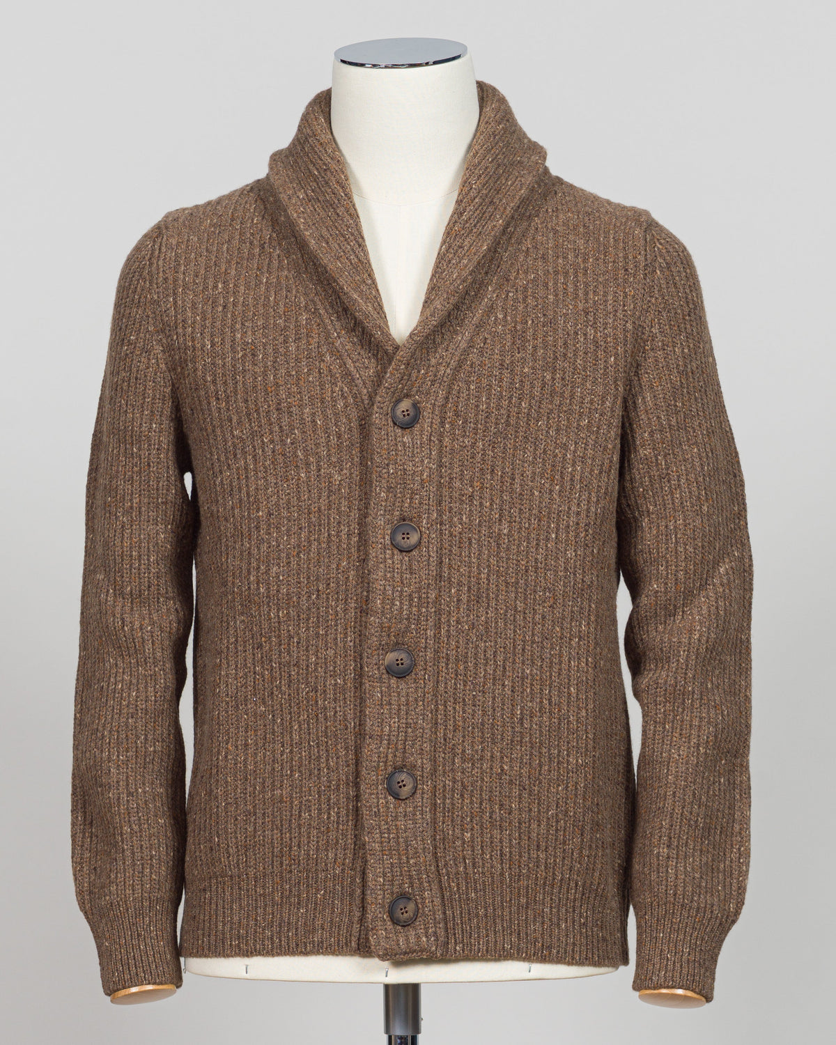 A brown ribbed knit cardigan sweater with a shawl collar and dark buttons, displayed on a white mannequin torso against a light gray background.