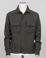 A dark green knit button-up cardigan sweater displayed on a white mannequin torso against a light gray background.
