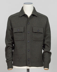 A dark green knit button-up cardigan sweater displayed on a white mannequin torso against a light gray background.