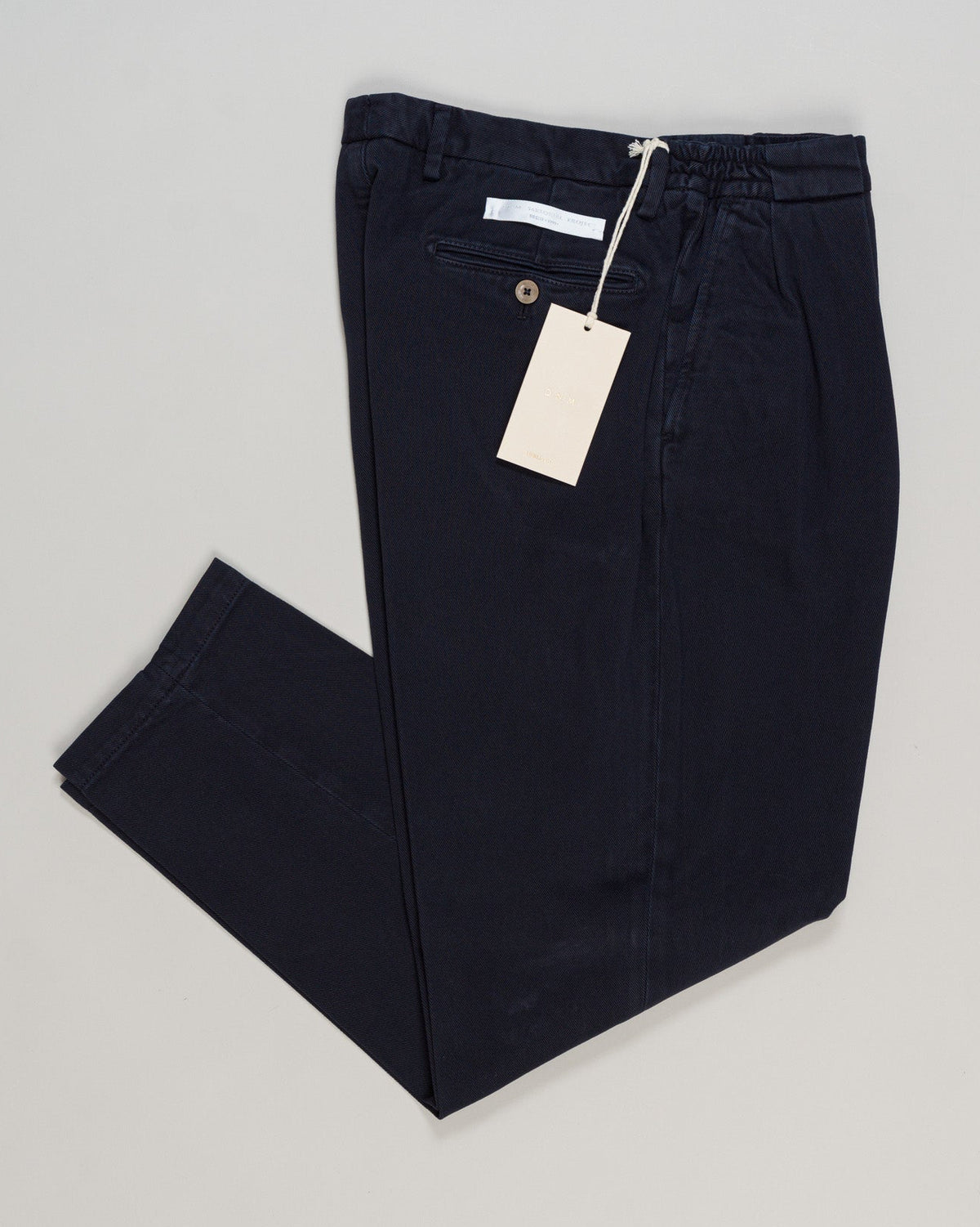 Briglia's Portobello cotton trousers deliver refined elegance in a versatile navy tone. Crafted from premium cotton, these trousers offer a comfortable fit with a polished appearance suitable for both professional and casual settings. The classic design ensures lasting appeal, while the quality construction supports tailoring for a personalized fit. A wardrobe essential that pairs effortlessly with blazers, knitwear, and dress shirts. Briglia Portobello Cotton Trousers / Navy