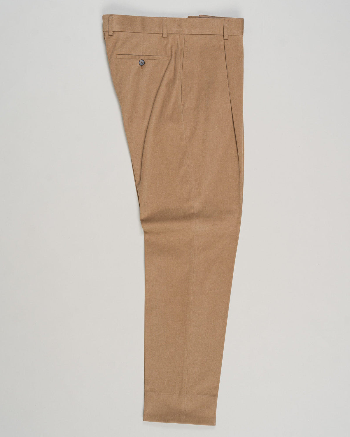 Refined cotton tailoring in a warm neutral tone. These brushed cotton trousers from Caruso deliver understated elegance through premium fabrication and precise construction. The biscotto shade complements both classic knitwear and formal shirting, making them a versatile foundation for refined wardrobes. Ideal for those seeking quality basics with measurable comfort and longevity. Caruso Brushed Cotton Trousers / Biscotto