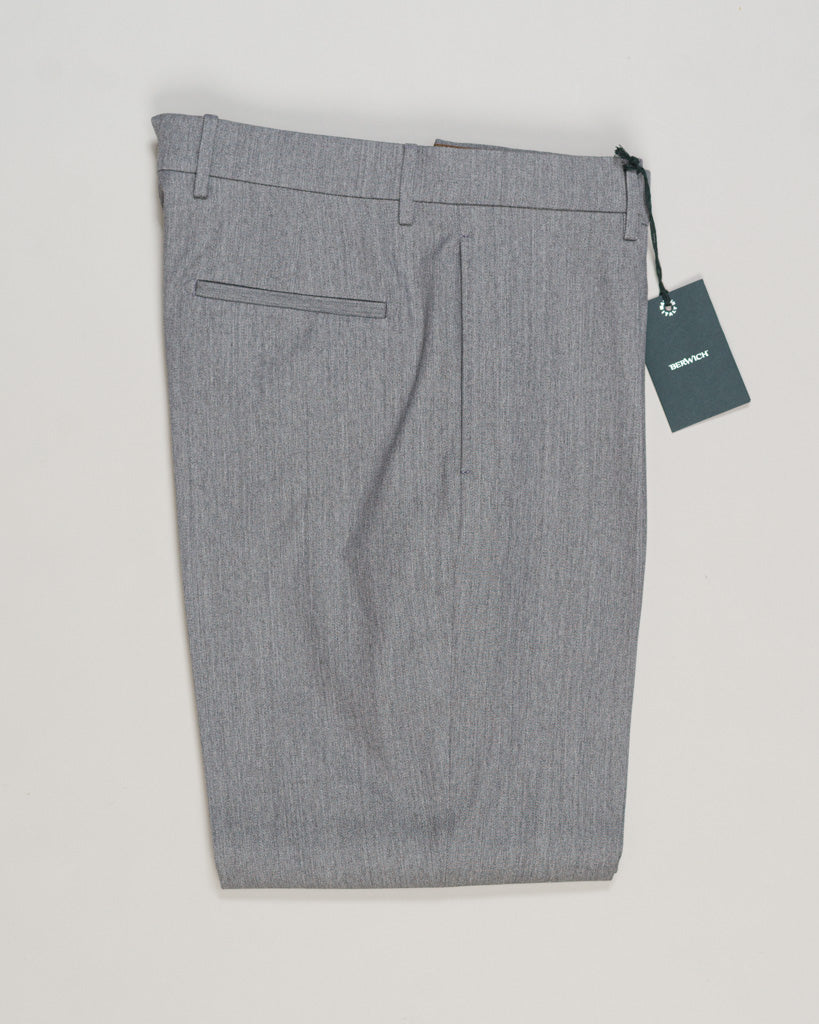 Crafted from a refined blend of wool and cotton, these Berwich trousers exemplify Italian tailoring at its finest. The long-staple gabardine weave delivers a subtle lustre and exceptional drape, while the balanced fibre composition ensures breathability and durability across seasons.

The versatile grey tone pairs seamlessly with sport coats, knitwear, and tailored jackets. Clean lines and a measured cut reflect contemporary menswear proportions without compromise on classic elegance.

A foundation piece fo