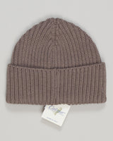 Timeless merino wool beanie in a refined taupe tone. The ribbed knit construction offers gentle stretch and durability, while premium merino regulates temperature across seasons. Perfect for everyday wear or as a sophisticated cold-weather essential. Finished with a clean, understated design that complements any wardrobe. Calimar Ribbed Merino Beanie / Taupe