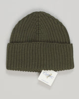 Pure merino wool construction delivers natural warmth and breathability. The ribbed knit offers a refined, understated aesthetic suited to classic wardrobes. Lightweight and packable, it transitions seamlessly across seasons. Italian craftsmanship ensures durability and comfort. Calimar Ribbed Merino Beanie / Green
