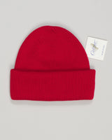 Crafted from pure wool in a rich red tone, this watch cap delivers warmth and understated style. The classic ribbed knit construction offers a comfortable fit that works equally well as everyday wear or a refined accessory for season transitions. Its compact silhouette pairs seamlessly with knitwear and outerwear alike.