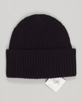 Refined cashmere beanie in classic black. Soft, breathable construction offers warmth without bulk, making it ideal for cold weather and versatile styling. The timeless silhouette pairs effortlessly with any wardrobe. Premium yarn ensures durability and lasting comfort season after season. Calimar Cashmere Beanie / Black