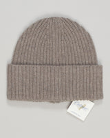 Crafted from pure cashmere, this beanie delivers luxurious warmth and timeless elegance. The soft taupe tone pairs effortlessly with any wardrobe—a versatile essential for season after season. Fine-gauge construction ensures a refined drape and comfortable fit that moves with you. Calimar Cashmere Beanie / Taupe