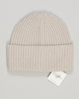Calimar's cashmere beanie in warm beige is a refined essential for cooler seasons. Crafted from premium cashmere, it delivers softness and breathability without bulk. The relaxed fit suits any occasion—casual outings or formal settings. Simple construction meets luxury fiber for timeless versatility and effortless elegance. Calimar Cashmere Beanie / Beige