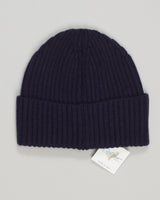 Crafted from pure merino wool, this ribbed beanie delivers exceptional warmth and breathability in a refined navy tone. The close-knit construction resists pilling while maintaining a soft, comfortable feel against skin. Ideal for cool seasons, it pairs effortlessly with any wardrobe. Calimar Ribbed Merino Beanie / Navy