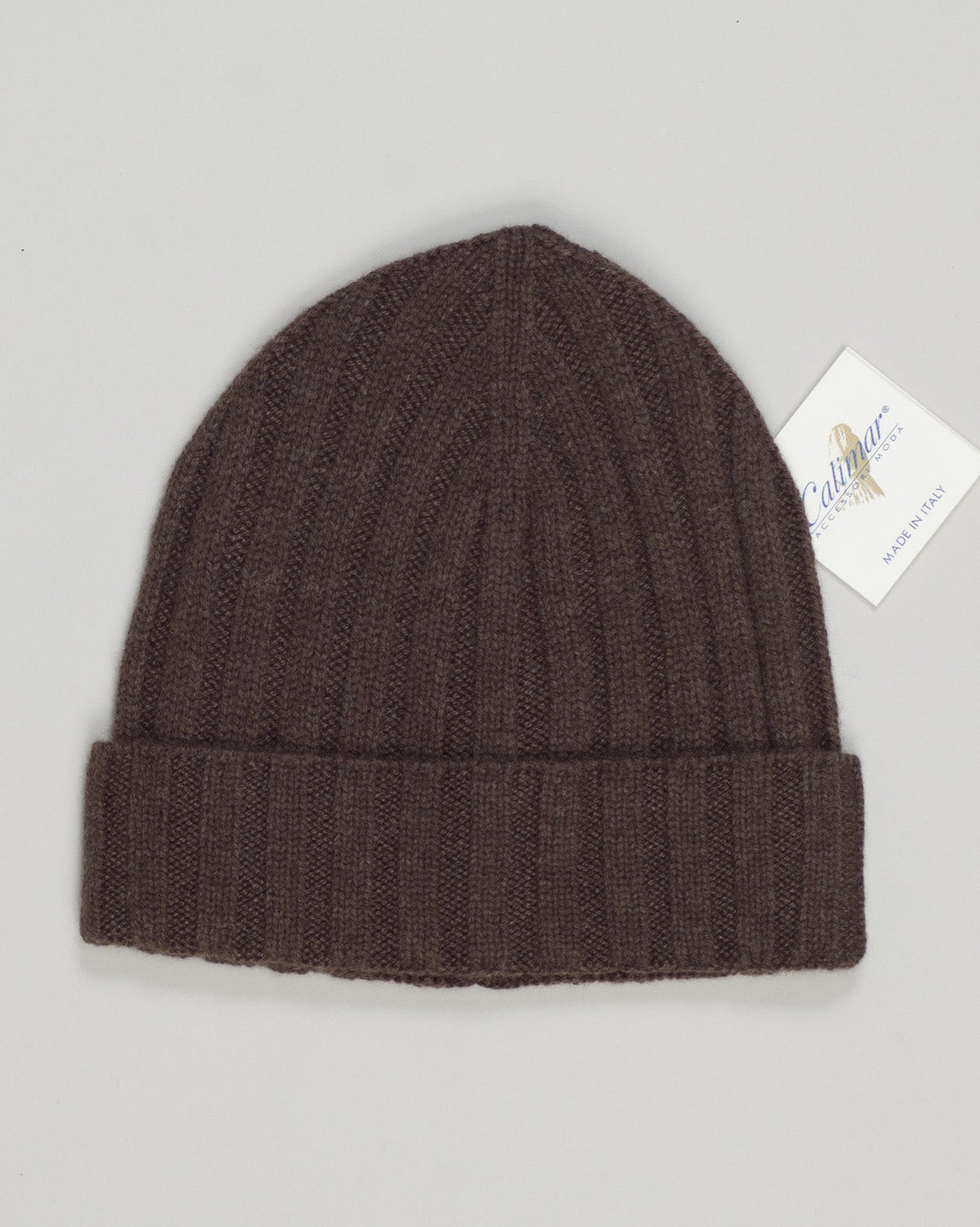 Crafted from pure cashmere, this lightweight beanie delivers exceptional softness and warmth without bulk. The refined brown tone pairs effortlessly with any wardrobe. Perfect for transitional seasons or as a sophisticated everyday accessory. Exceptionally breathable while maintaining gentle insulation—a luxury essential for discerning tastes. Calimar Light Cashmere Beanie / Brown