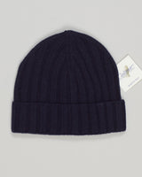 Refined luxury meets everyday comfort in this lightweight cashmere beanie. Hand-finished in rich navy, it delivers the warmth and softness of premium fibers without bulk. Perfect for layering beneath outerwear or wearing solo, this essential piece transitions seamlessly from season to season. Calimar Light Cashmere Beanie / Navy