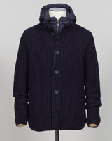 Herno's lined cardigan in navy combines Italian craftsmanship with refined minimalism. Constructed from premium wool with a structured silhouette, the interior lining ensures comfort through layering or as a standalone piece. The clean lines and versatile navy tone work seamlessly with tailored trousers or casual wear, making it an essential addition to a modern menswear wardrobe. Perfect for transitional seasons or layering year-round.