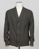 Italian craftsmanship meets understated elegance. This wool cardigan from Gran Sasso delivers refined layering in a deep, versatile dark green. Perfect for building a refined wardrobe foundation—wear it over a crisp shirt or as a standalone piece. The quality construction ensures lasting wear and aging gracefully. Gran Sasso Wool Cardigan / Dark Green