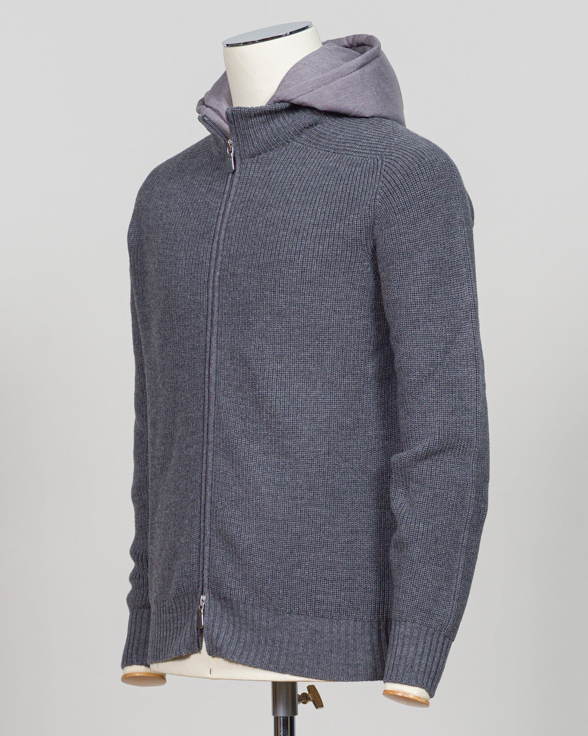Water-repellent merino wool hoodie in warm grey. Engineered for layering and everyday wear, this Gran Sasso piece combines breathable warmth with practical weather resistance. Perfect for transitional seasons and active lifestyles. Gran Sasso Rain Wool Hoodie / Grey
