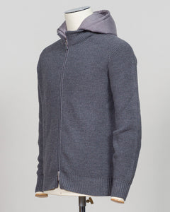Water-repellent merino wool hoodie in warm grey. Engineered for layering and everyday wear, this Gran Sasso piece combines breathable warmth with practical weather resistance. Perfect for transitional seasons and active lifestyles. Gran Sasso Rain Wool Hoodie / Grey
