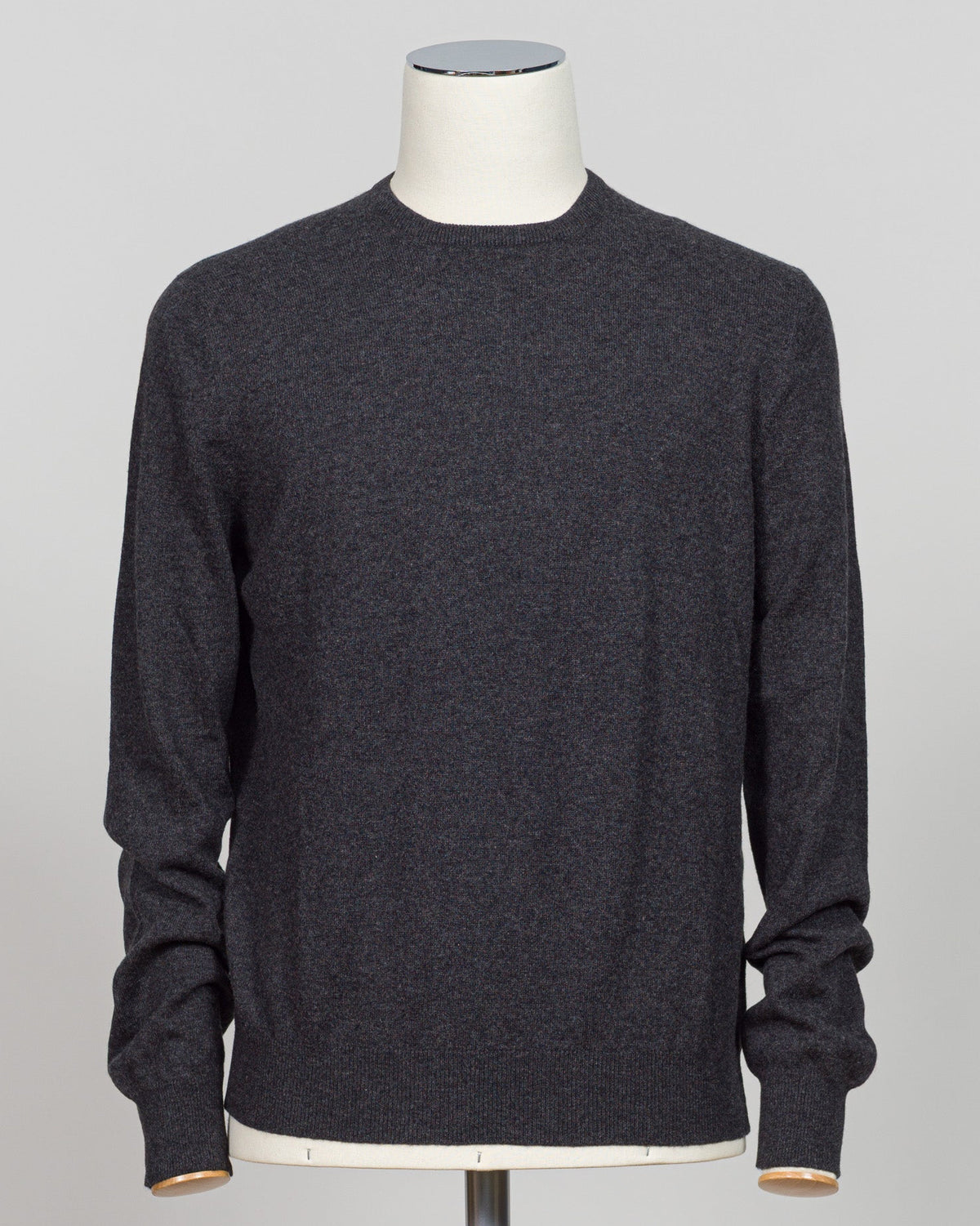Timeless elegance crafted from pure cashmere. This crew neck from Gran Sasso delivers softness and refinement in a versatile antracite tone that pairs effortlessly with tailored trousers or contemporary knitwear layers. The relaxed fit maintains its shape season after season, a hallmark of Italian luxury construction. Perfect for the discerning wardrobe seeking understated sophistication. Gran Sasso Cashmere Crew Neck / Antracite