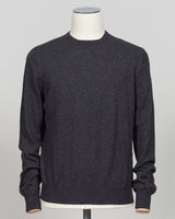 Timeless elegance crafted from pure cashmere. This crew neck from Gran Sasso delivers softness and refinement in a versatile antracite tone that pairs effortlessly with tailored trousers or contemporary knitwear layers. The relaxed fit maintains its shape season after season, a hallmark of Italian luxury construction. Perfect for the discerning wardrobe seeking understated sophistication. Gran Sasso Cashmere Crew Neck / Antracite
