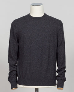 Timeless elegance crafted from pure cashmere. This crew neck from Gran Sasso delivers softness and refinement in a versatile antracite tone that pairs effortlessly with tailored trousers or contemporary knitwear layers. The relaxed fit maintains its shape season after season, a hallmark of Italian luxury construction. Perfect for the discerning wardrobe seeking understated sophistication. Gran Sasso Cashmere Crew Neck / Antracite