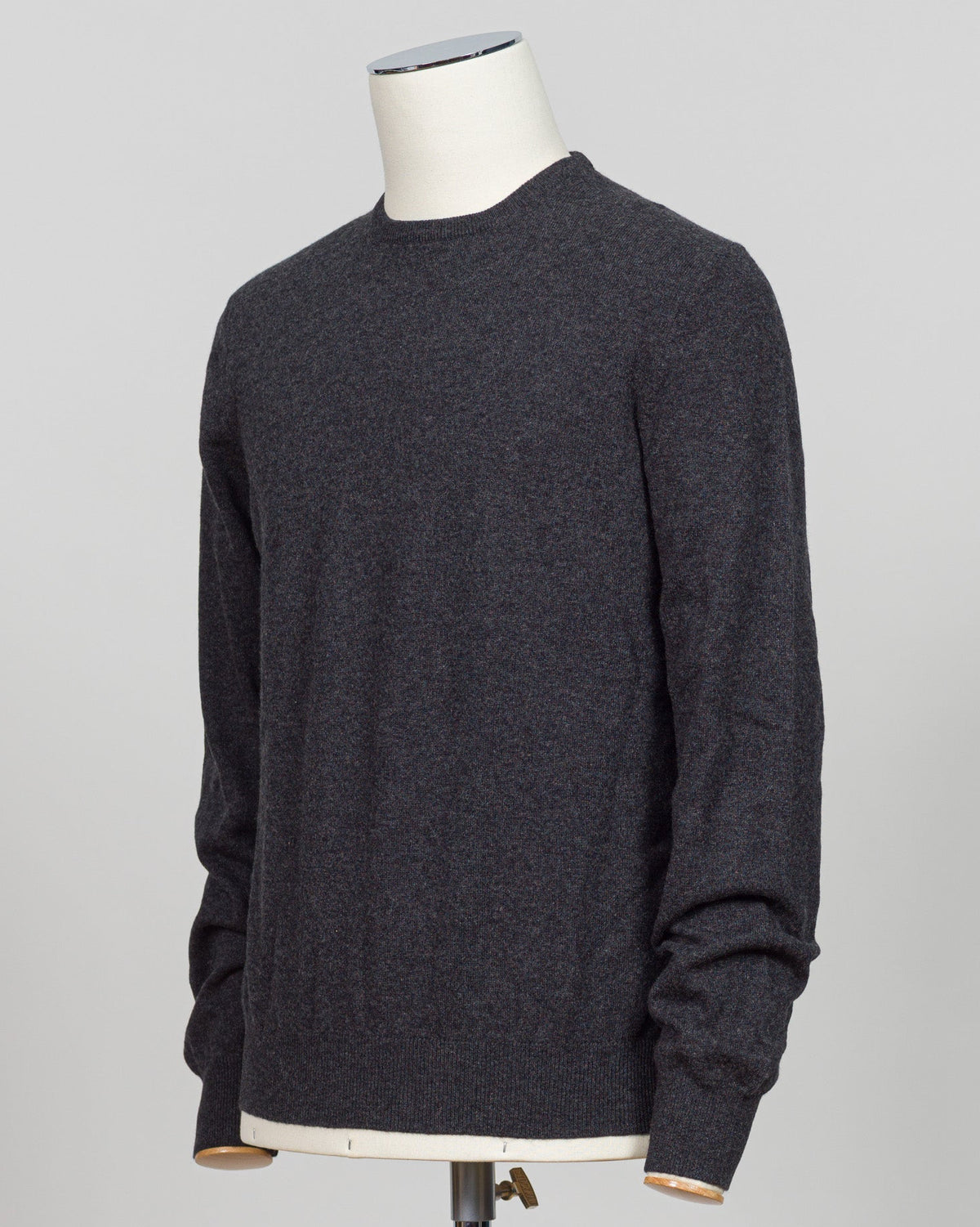 Timeless elegance crafted from pure cashmere. This crew neck from Gran Sasso delivers softness and refinement in a versatile antracite tone that pairs effortlessly with tailored trousers or contemporary knitwear layers. The relaxed fit maintains its shape season after season, a hallmark of Italian luxury construction. Perfect for the discerning wardrobe seeking understated sophistication. Gran Sasso Cashmere Crew Neck / Antracite