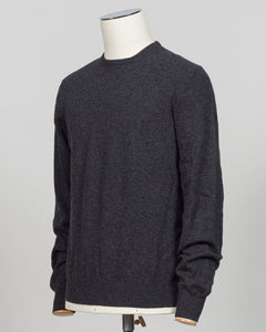 Timeless elegance crafted from pure cashmere. This crew neck from Gran Sasso delivers softness and refinement in a versatile antracite tone that pairs effortlessly with tailored trousers or contemporary knitwear layers. The relaxed fit maintains its shape season after season, a hallmark of Italian luxury construction. Perfect for the discerning wardrobe seeking understated sophistication. Gran Sasso Cashmere Crew Neck / Antracite