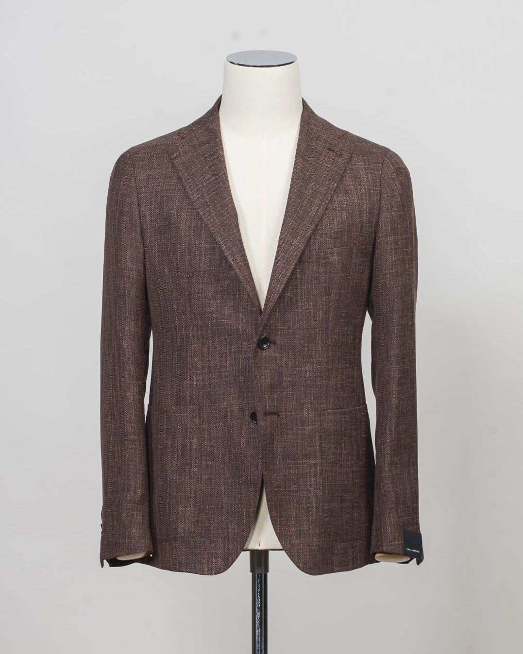 Composition: 68% Virgin Wool 18% Silk 14% Linen
Modello: Monte Carlo / 1SMC22K
Color: Brown / M3247
Unconstructed shoulder
Unlined
2 Buttons

Notch lapel
Patch pockets
Side vents
Made in Martina Franca, Italy