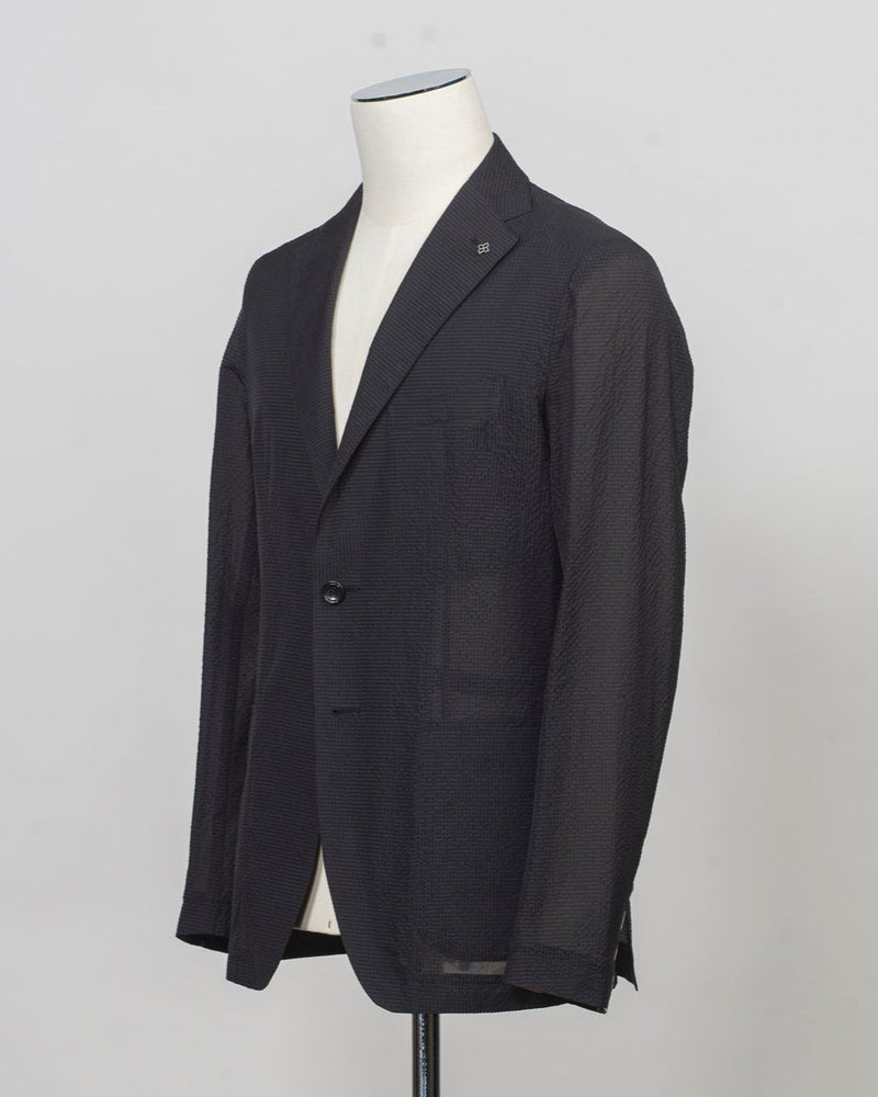 Composition: 55% Polyamide(Nylon) 45% Polyester
Modello: Monte Carlo / 1SMC22K
Color: Black / EN804
Unconstructed shoulder
Unlined
2 Buttons

Notch lapel
Patch pockets
Side vents
Made in Martina Franca, Italy