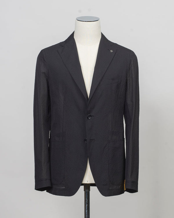 Composition: 55% Polyamide(Nylon) 45% Polyester
Modello: Monte Carlo / 1SMC22K
Color: Black / EN804
Unconstructed shoulder
Unlined
2 Buttons

Notch lapel
Patch pockets
Side vents
Made in Martina Franca, Italy