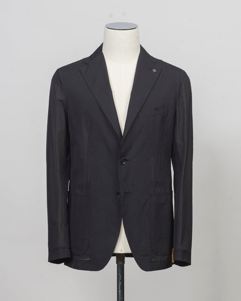 Composition: 55% Polyamide(Nylon) 45% Polyester
Modello: Monte Carlo / 1SMC22K
Color: Black / EN804
Unconstructed shoulder
Unlined
2 Buttons

Notch lapel
Patch pockets
Side vents
Made in Martina Franca, Italy