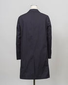 Raincoat in dyed cotton gabardine with waterproof treatment.
Sporting a shirt collar, this straight-cut piece is a Herno icon designed for city engagements and more formal occasions.
This fabric, created by Herno - Officina Tessile, symbolises their heritage and the innovative research it has honed since 1948.


Regular fit
Shirt collar

Side pockets

Slit at the back

Covered button fastening
