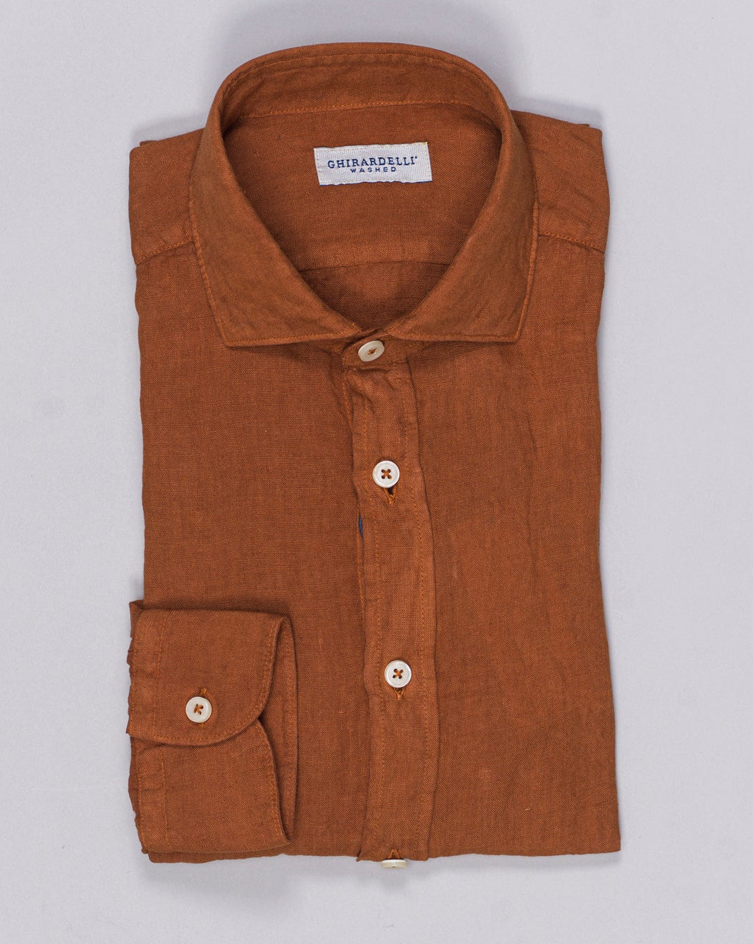 Cutaway collar
Curved hem
Front placket
100% linen
Art. TC 162
Mod. 65/TC
Color: A11 Burned Orange Ghirardelli Linen Shirt / Burned Orange