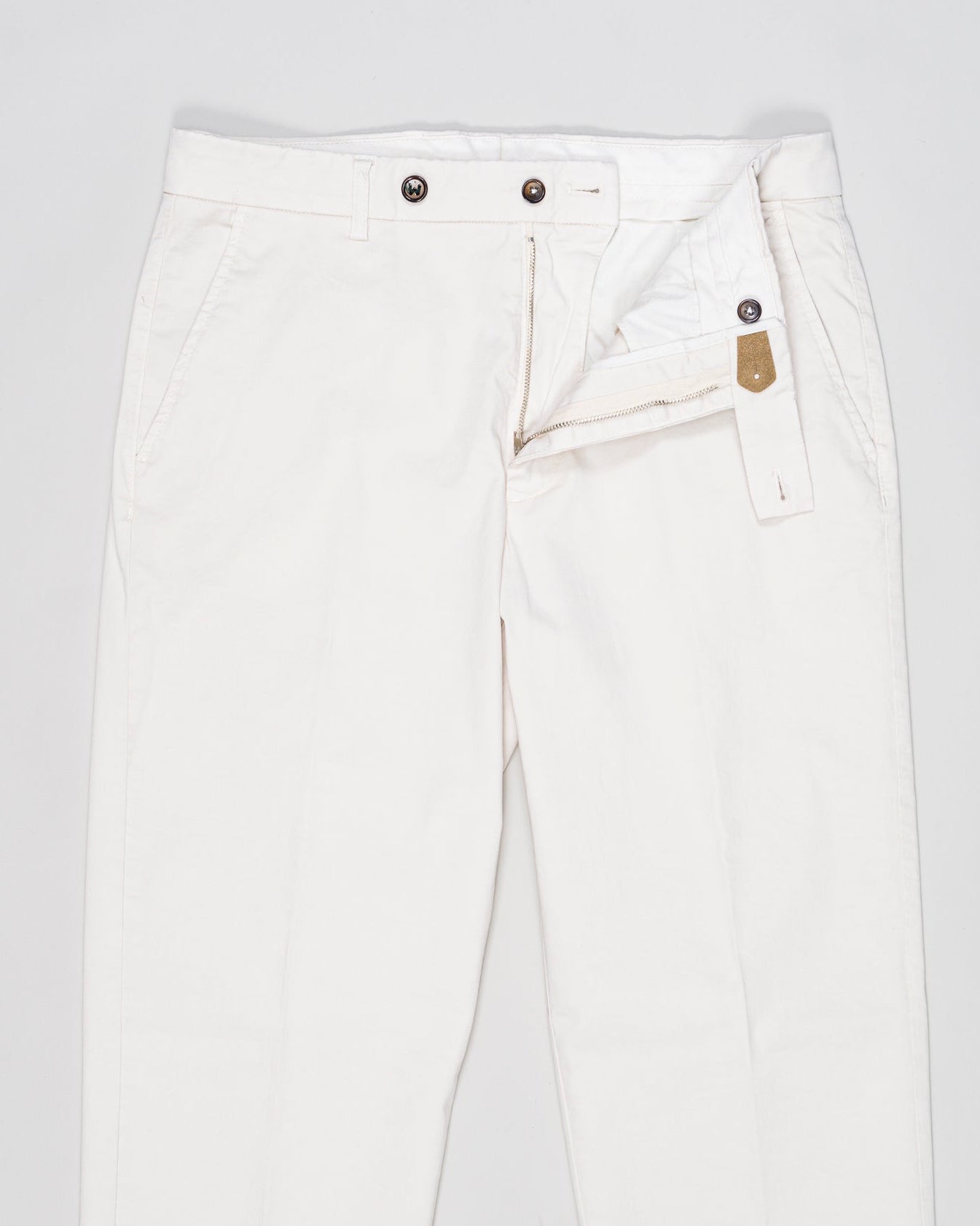 Flat front
Garment Dyed
Front pockets: slanted
Back pocket left: welt, right: welt with button
Hemming: plain (chinos)
Article: ts0001x
Color: Ecru 275
Model: vulcano23-GD
Composition: 98% Cotton 2%Elastan
Made in Martina Franca, Italy Berwich Garment Dyed Cotton Chinos / Ecru