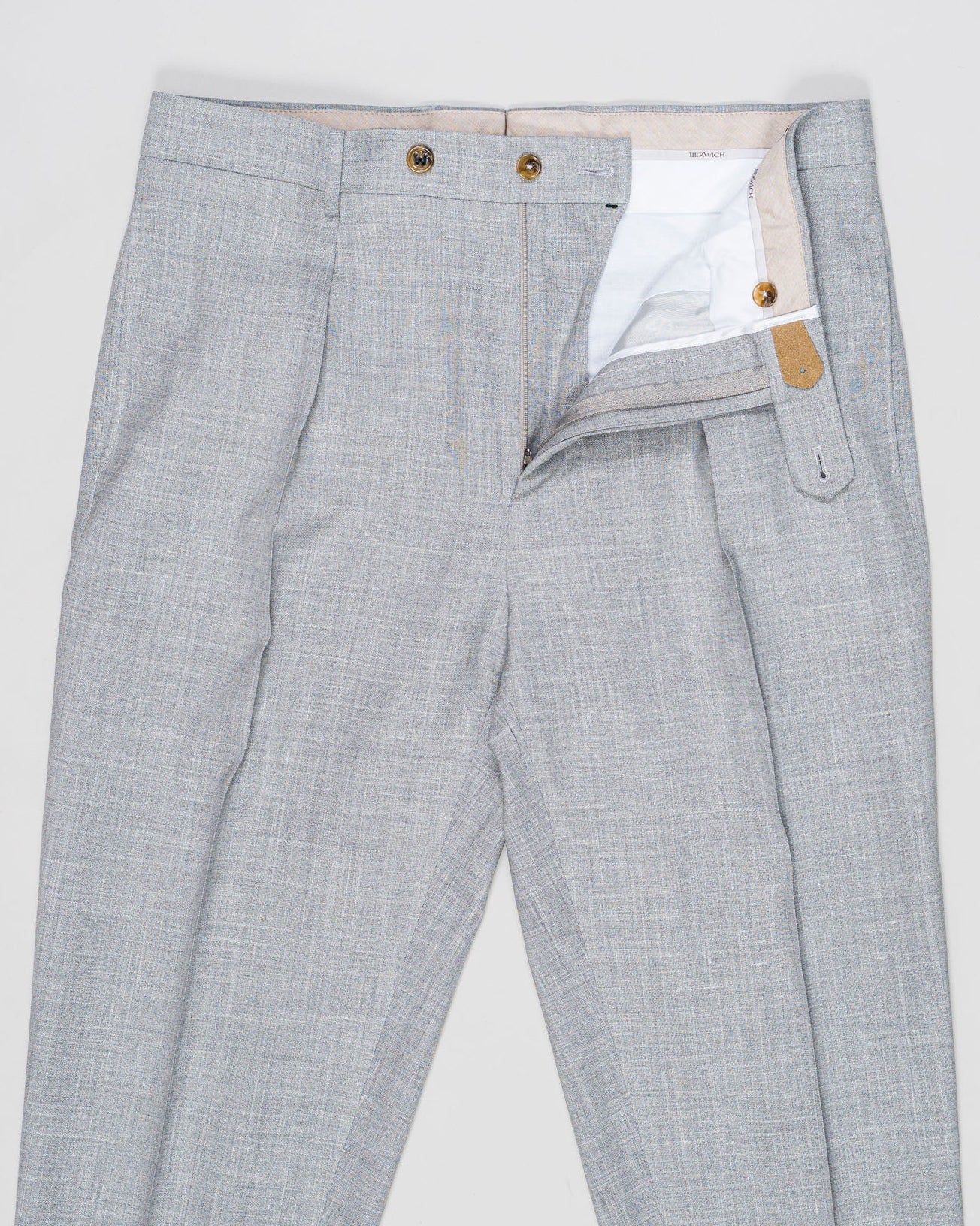 Fabric: Loro Piana Summertime: 71% Virgin wool natural stretch 15% Silk 14% Linen
Model: Chiaia Long
Article: PU19CHIAIALONGLP184U
Color: Light Grey
Made in Martina Franca, Puglia, Italy Berwich Chiaia Long Loro Piana Summertime Trousers / Light Grey