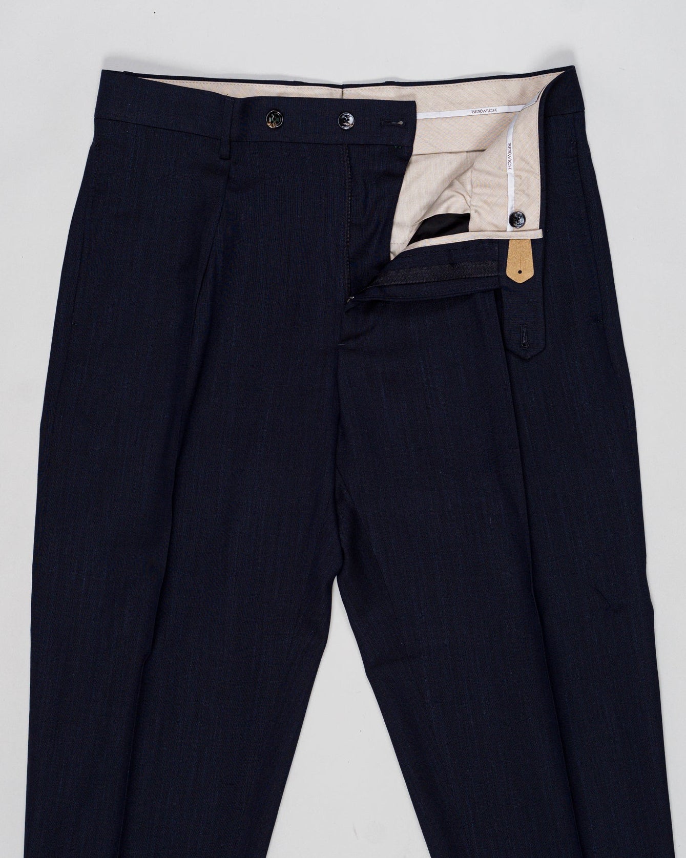 Fabric: Loro Piana Summertime: 71% Virgin wool natural stretch 15% Silk 14% Linen
Model: Chiaia Long
Article: PU19CHIAIALONGLP184U
Color: Navy
Made in Martina Franca, Puglia, Italy Berwich Chiaia Long Loro Piana Summertime Trousers / Navy