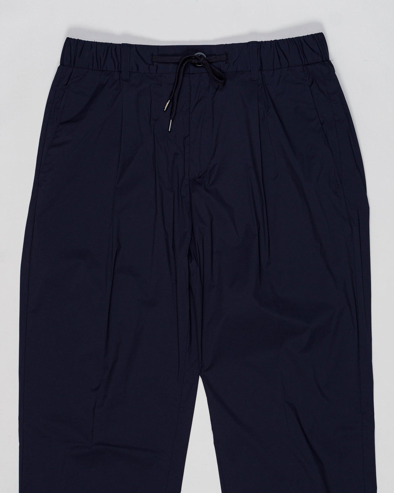 Elastic with drawstring waist
Beltloops
Zip and button fastening
Slanted pockets
Welted pockets on the back
Material: 86%pa 14%ea
Article: PT000193U-12431SZ
Color: 9201 / Blue
Made in Republic of Moldova Herno Nylon Stretch Trousers / Blue
