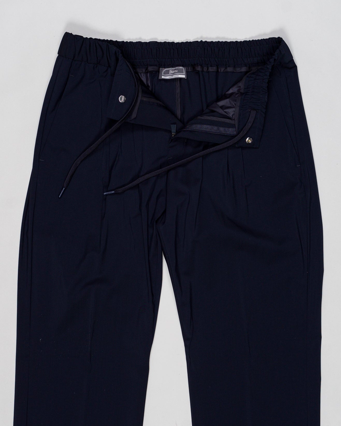 Elastic with drawstring waist
Zip and snap button fastening
Slanted pockets
Back pocket with snap button
Article: PT000183U 33484
Color: 9200 / Navy
Made in Republic of Moldova Herno Wool & Nylon Stretch Trousers / Navy