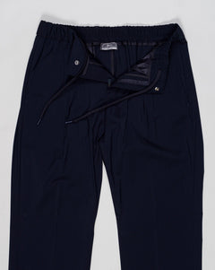 Elastic with drawstring waist
Zip and snap button fastening
Slanted pockets
Back pocket with snap button
Article: PT000183U 33484
Color: 9200 / Navy
Made in Republic of Moldova Herno Wool &amp; Nylon Stretch Trousers / Navy