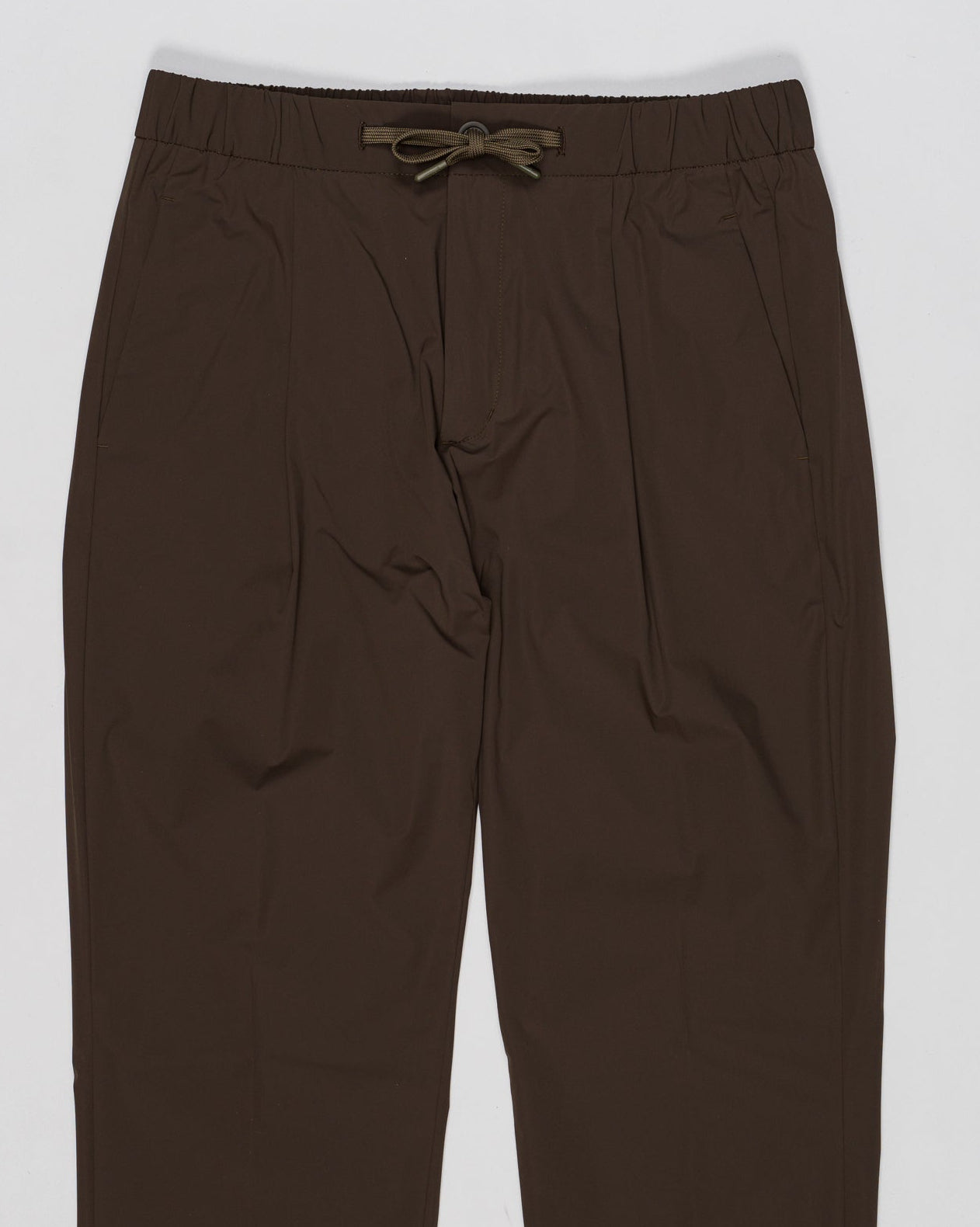 Elastic with drawstring waist
Zip and button fastening
Slanted pockets
Welted pockets on the back
Article: PT000077U 12691Z
Color: 7400 / Green Herno Nylon Stretch Trousers / Green